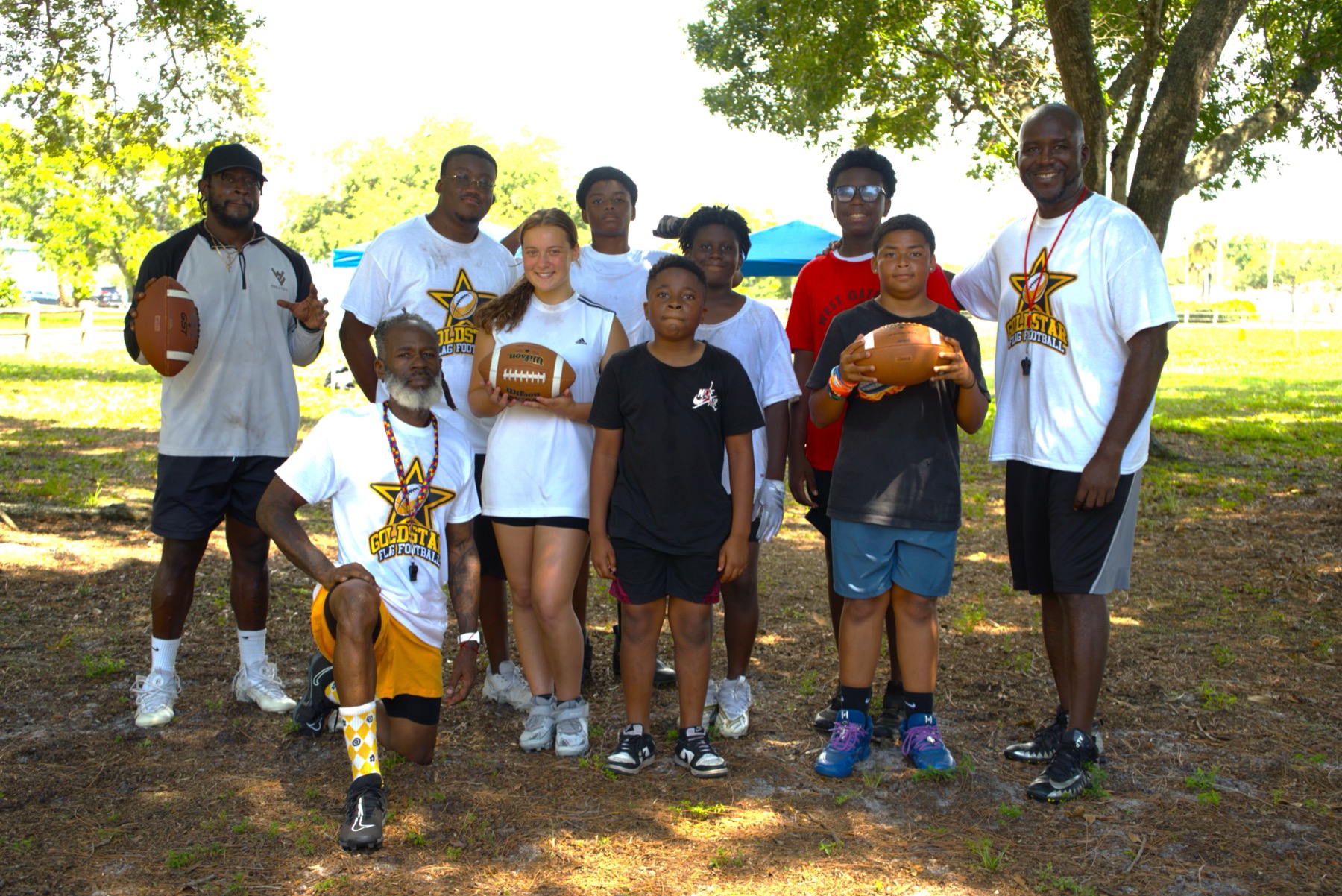 GoldStar coaches and athletes at the park